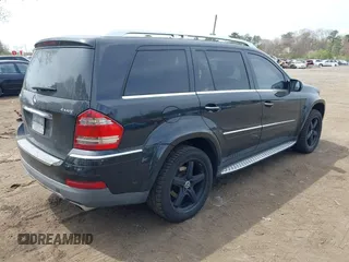 2009 Mercedes-Benz GL-Class 5.5L with VIN 4JGBF86E29A530952, listed as a IAAI auction lot 42112828 with 135,474 mi miles. Bid and sale history available at carsss.com. Image 4.