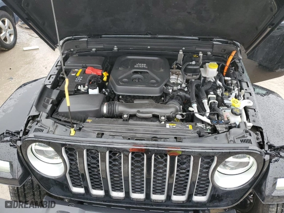 2021 Jeep Wrangler 4xe Unlimited Sahara with VIN 1C4JJXP68MW767277, listed as a Copart auction lot 47885665 with 53,869 mi miles and Salvage Title. Bid and sale history available at carsss.com. Image 12.