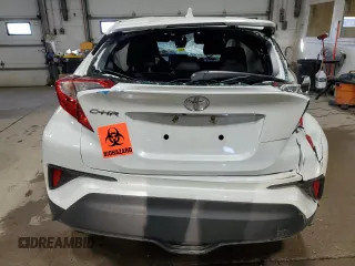 2021 Toyota C-HR LE z VIN NMTKHMBX2MR140040, wystawiony jako Copart lot #50598335 z przebiegiem Nie podano mil oraz Szkoda całkowita • Salvage title. Historia ofert i sprzedaży dostępna na DreamBid. Obrazek 6.
