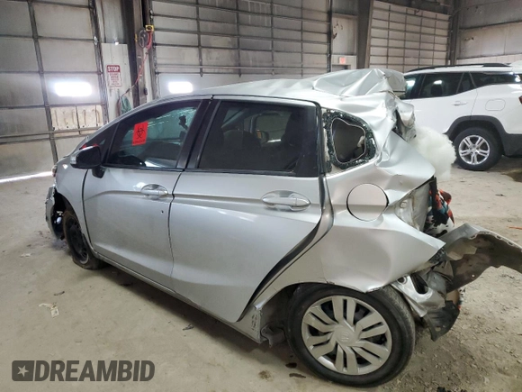 2015 Honda Fit LX with VIN 3HGGK5H53FM748495, listed as a Copart auction lot 86590994 with 124,000 mi miles and Salvage Title. Bid and sale history available at carsss.com. Image 2.
