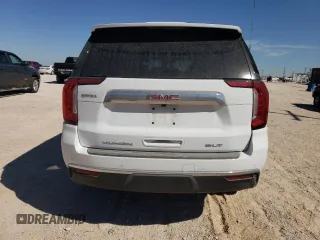 2024 GMC Yukon SLT with VIN 1GKS2BKD6RR237359, listed as a Copart auction lot 77892564 with 9,880 mi miles and Salvage Title. Bid and sale history available at carsss.com. Image 6.
