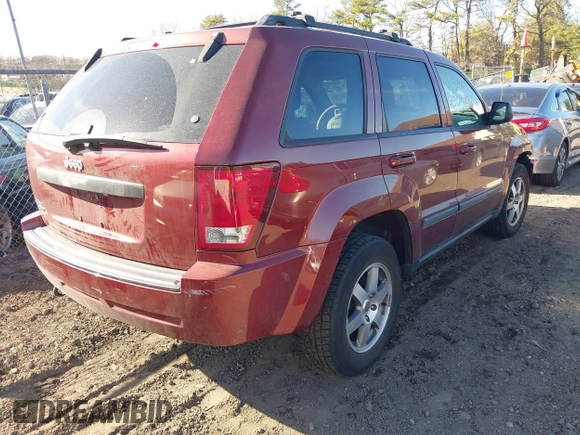 2008 Jeep Grand Cherokee Laredo with VIN 1J8GR48K28C164998, listed as a IAAI auction lot 41844702 with 999,999 mi miles. Bid and sale history available at carsss.com. Image 4.