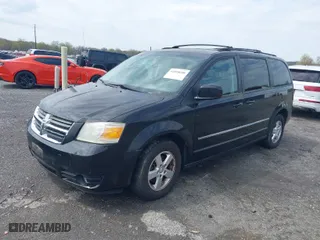 2010 Dodge Grand Caravan SXT with VIN 2D4RN5D11AR201781, listed as a IAAI auction lot 42028688 with 147,563 mi miles. Bid and sale history available at carsss.com. Image 2.