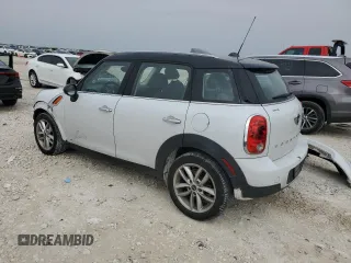 2013 MINI Countryman with VIN WMWZB3C5XDWM31620, listed as a Copart auction lot 51096035 with 93,928 mi miles and Salvage title. Bid and sale history available at DreamBid. Image 2.