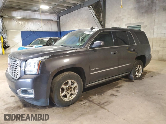 2015 GMC Yukon Denali with VIN 1GKS2CKJ2FR677604, listed as a Copart auction lot 51714505 with 146,648 mi miles and Salvage Title. Bid and sale history available at carsss.com. Image 1.