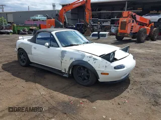 1990 Mazda MX-5 Miata with VIN JM1NA3518L0124740, listed as a IAAI auction lot 42013691 with 128,391 mi miles and . Bid and sale history available at DreamBid. Image 1.