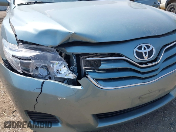 2011 Toyota Camry LE z VIN 4T4BF3EK3BR128796, wystawiony jako IAAI lot #42232144 z przebiegiem 127 823 mil mil oraz . Historia ofert i sprzedaży dostępna na DreamBid. Obrazek 6.