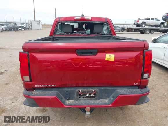 2023 Chevrolet Colorado 2WD LT z VIN 1GCPSCEK7P1269024, wystawiony jako IAAI lot #41788940 z przebiegiem Nie podano mil oraz . Historia ofert i sprzedaży dostępna na DreamBid. Obrazek 17.