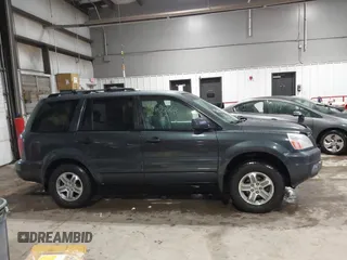 2005 Honda Pilot EX-L z VIN 2HKYF18715H564632, wystawiony jako IAAI lot #41685668 z przebiegiem 253 495 mil mil oraz . Historia ofert i sprzedaży dostępna na DreamBid. Obrazek 13.
