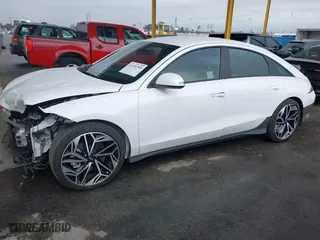 2023 Hyundai IONIQ 6 SEL with VIN KMHM34AA9PA034042, listed as a IAAI auction lot 41194785 with 13168 miles. Bid and sale history available at carsss.com. Image 17.