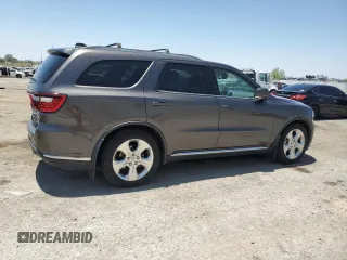 2014 Dodge Durango Limited with VIN 1C4RDHDG4EC494905, listed as a Copart auction lot 60565235 with 169,069 mi miles and Salvage title. Bid and sale history available at DreamBid. Image 3.