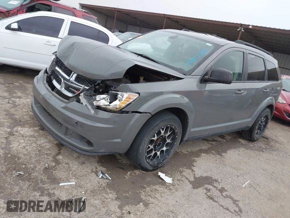 2019 Dodge Journey SE Value with VIN 3C4PDCAB5KT866156, listed as a IAAI auction lot 41910368 with 123,025 mi miles and . Bid and sale history available at DreamBid. Image 2.