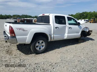 2007 Toyota Tacoma PreRunner with VIN 3TMJU62N57M047584, listed as a Copart auction lot 55884725 with 296,545 mi miles and Salvage title. Bid and sale history available at DreamBid. Image 3.