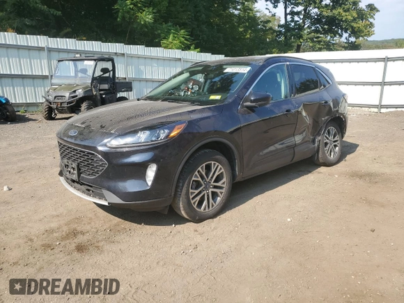 2021 Ford Escape SEL Hybrid z VIN 1FMCU9CZ7MUA94260, wystawiony jako Copart lot #71013514 z przebiegiem Nie podano mil oraz Szkoda całkowita • Salvage title. Historia ofert i sprzedaży dostępna na DreamBid. Obrazek 1.