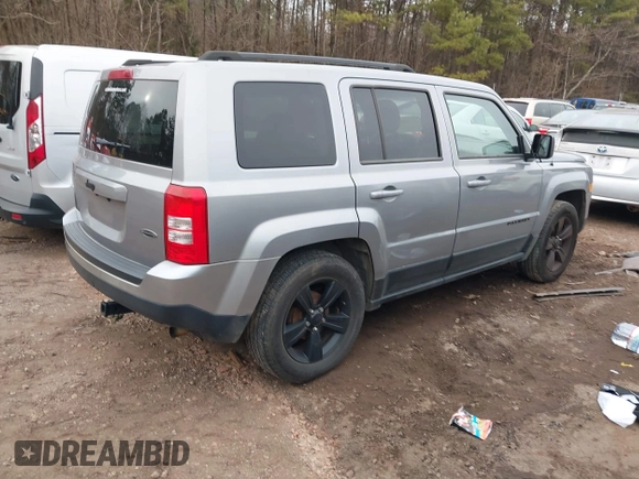 2015 Jeep Patriot Altitude Edition with VIN 1C4NJPBA8FD399095, listed as a IAAI auction lot 41236068 with 119,298 mi miles. Bid and sale history available at carsss.com. Image 4.