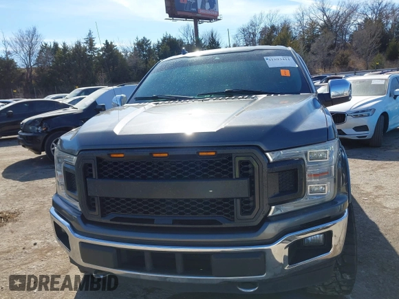 2018 Ford F-150 XL with VIN 1FTEW1EG2JKC51138, listed as a IAAI auction lot 41593411 with 149,324 mi miles. Bid and sale history available at carsss.com. Image 12.