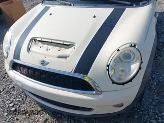 2010 MINI Convertible S with VIN WMWMS3C58ATY09098, listed as a IAAI auction lot 42149773 with 127,424 mi miles and . Bid and sale history available at DreamBid. Image 6.