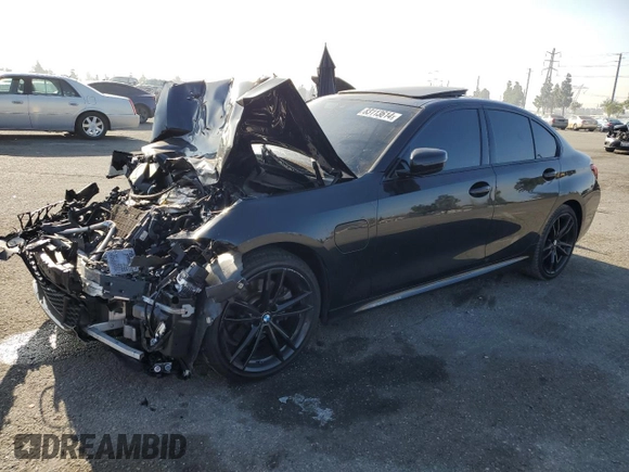 2021 BMW 3 Series 330e with VIN 3MW5P7J03M8C03997, listed as a Copart auction lot 83113614 with 0 mi miles and Salvage Title. Bid and sale history available at carsss.com. Image 1.