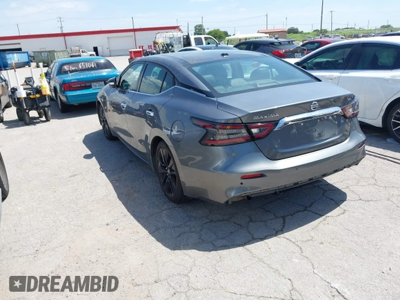 2020 Nissan Maxima SL with VIN 1N4AA6DVXLC373467, listed as a IAAI auction lot 42784055 with 221,014 mi miles and . Bid and sale history available at DreamBid. Image 3.