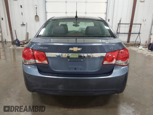2014 Chevrolet Cruze 1LT z VIN 1G1PC5SB4E7175022, wystawiony jako IAAI lot #41563090 z przebiegiem 109 754 mil mil oraz . Historia ofert i sprzedaży dostępna na DreamBid. Obrazek 16.