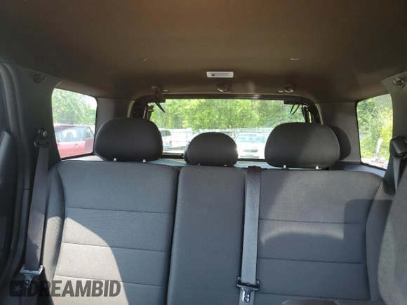 2012 Ford Escape XLT z VIN 1FMCU9DG8CKB35535, wystawiony jako Copart lot #60202675 z przebiegiem 205 750 mil mil oraz Szkoda całkowita • Salvage title. Historia ofert i sprzedaży dostępna na DreamBid. Obrazek 10.