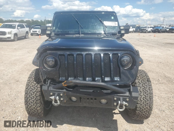 2021 Jeep Wrangler Unlimited Willys with VIN 1C4HJXDN0MW859686, listed as a Copart auction lot 56657725 with 49,984 mi miles and Salvage title. Bid and sale history available at DreamBid. Image 5.