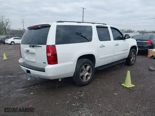 2007 Chevrolet Suburban LTZ with VIN 3GNFK16357G270799, listed as a IAAI auction lot 41966944 with 236,792 mi miles. Bid and sale history available at carsss.com. Image 4.