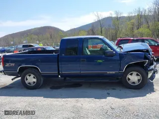 1998 Chevrolet C/K 1500 with VIN 2GCEK19R7W1265535, listed as a IAAI auction lot 42005362 with 297,940 mi miles. Bid and sale history available at carsss.com. Image 13.