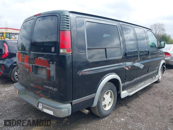 1999 Chevrolet Chevy Van z VIN 1GBFG15M0X1048842, wystawiony jako IAAI lot #41978139 z przebiegiem 188 274 mil mil oraz . Historia ofert i sprzedaży dostępna na DreamBid. Obrazek 4.