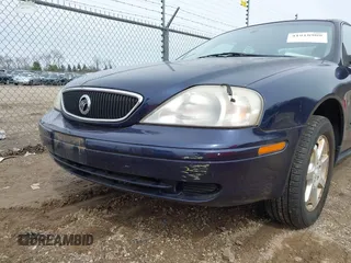 2000 Mercury Sable LS Premium Group z VIN 1MEFM53S8YG618077, wystawiony jako IAAI lot #41918900 z przebiegiem 340 048 mil mil oraz . Historia ofert i sprzedaży dostępna na DreamBid. Obrazek 6.