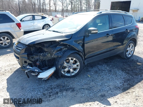2014 Ford Escape Titanium with VIN 1FMCU9JX2EUA96338, listed as a IAAI auction lot 41806850 with 127,745 mi miles. Bid and sale history available at carsss.com. Image 17.