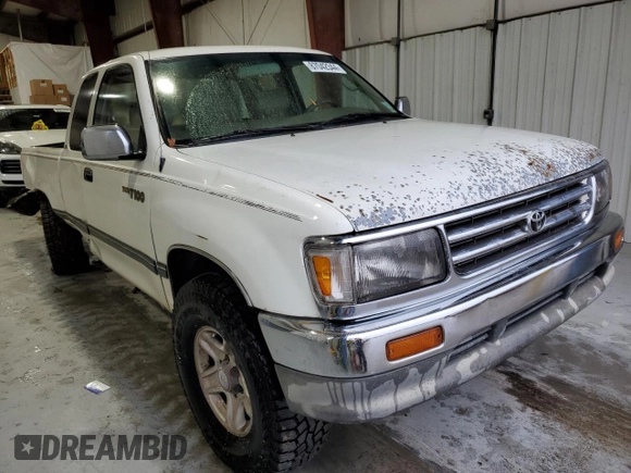 1997 Toyota T100 SR5 with VIN JT4UN24D9V0048079, listed as a Copart auction lot 87042344 with 303,785 mi miles and Salvage Title. Bid and sale history available at DreamBid. Image 4.