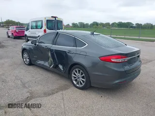 2017 Ford Fusion Energi SE with VIN 3FA6P0PU9HR227932, listed as a IAAI auction lot 42177500 with 106,938 mi miles. Bid and sale history available at carsss.com. Image 3.