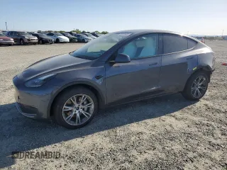 2023 Tesla Model Y Long Range z VIN 7SAYGDEE1PF873698, wystawiony jako Copart lot #51016695 z przebiegiem 56 462 mil mil oraz Szkoda całkowita • Salvage title. Historia ofert i sprzedaży dostępna na DreamBid. Obrazek 1.