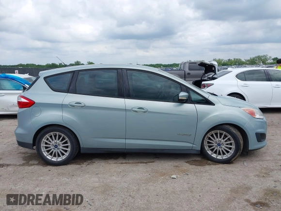 2014 Ford C-Max SE z VIN 1FADP5AU7EL508750, wystawiony jako IAAI lot #42139897 z przebiegiem 117 685 mil mil oraz . Historia ofert i sprzedaży dostępna na DreamBid. Obrazek 13.