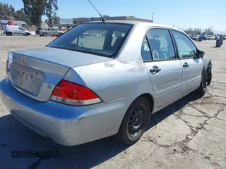 2005 Mitsubishi Lancer ES with VIN JA3AJ26E15U053014, listed as a IAAI auction lot 41679770 with 149,125 mi miles. Bid and sale history available at carsss.com. Image 4.