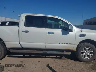 2016 Nissan Titan SL z VIN 1N6BA1F21GN504118, wystawiony jako IAAI lot #41729710 z przebiegiem 127 760 mil mil oraz . Historia ofert i sprzedaży dostępna na DreamBid. Obrazek 12.