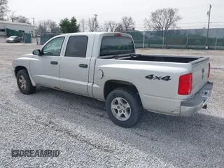 2006 Dodge Dakota SLT with VIN 1D7HW48N06S605938, listed as a IAAI auction lot 41669424 with 193,069 mi miles. Bid and sale history available at carsss.com. Image 3.