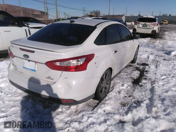 2013 Ford Focus SE z VIN 1FADP3F23DL337201, wystawiony jako IAAI lot #41630163 z przebiegiem 163 979 mil mil oraz . Historia ofert i sprzedaży dostępna na DreamBid. Obrazek 4.