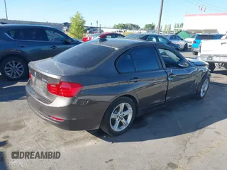 2014 BMW 3 Series 328d xDrive with VIN WBA3D5C58EKX97290, listed as a IAAI auction lot 40453599 with Not Provided miles. Bid and sale history available at carsss.com. Image 4.