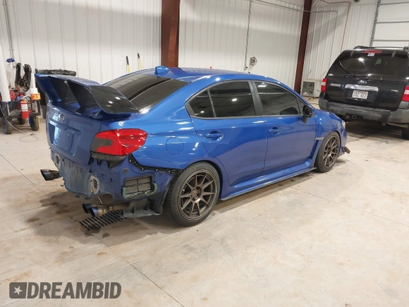 2015 Subaru WRX with VIN JF1VA1A61F9834946, listed as a IAAI auction lot 41636643 with 85,013 mi miles. Bid and sale history available at carsss.com. Image 4.