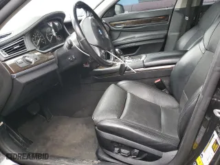 2012 BMW 7 Series 750i xDrive with VIN WBAKC6C52CC396443, listed as a Copart auction lot 44333945 with 134,075 mi miles and Salvage Title. Bid and sale history available at carsss.com. Image 7.