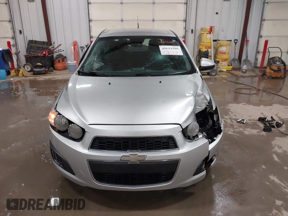 2014 Chevrolet Sonic LT with VIN 1G1JC5SG8E4107664, listed as a IAAI auction lot 41614306 with 128,946 mi miles and . Bid and sale history available at DreamBid. Image 12.