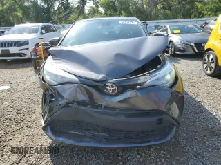 2021 Toyota C-HR LE z VIN NMTKHMBX1MR121205, wystawiony jako Copart lot #52317525 z przebiegiem 73 654 mil mil oraz Nie do naprawy. Historia ofert i sprzedaży dostępna na DreamBid. Obrazek 5.