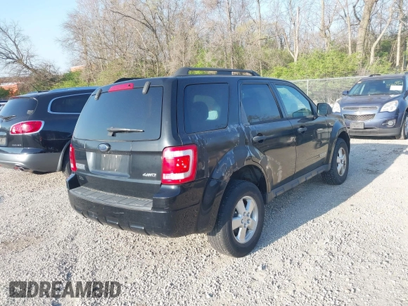 2008 Ford Escape XLT with VIN 1FMCU93138KD65438, listed as a IAAI auction lot 42073549 with 185,343 mi miles. Bid and sale history available at carsss.com. Image 4.