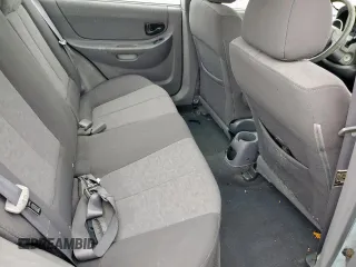 2003 Hyundai Accent GL z VIN KMHCG45C73U481294, wystawiony jako Copart lot #55958005 z przebiegiem 136 964 mil mil oraz Czysty tytuł • Clean title. Historia ofert i sprzedaży dostępna na DreamBid. Obrazek 10.