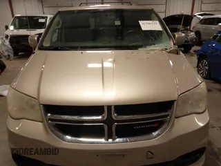 2013 Dodge Grand Caravan SXT with VIN 2C4RDGCG0DR567186, listed as a IAAI auction lot 41706119 with 112,512 mi miles and . Bid and sale history available at DreamBid. Image 20.