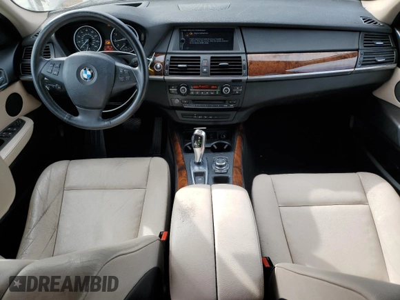 2012 BMW X5 35i z VIN 5UXZV4C51CL989449, wystawiony jako Copart lot #56762095 z przebiegiem 112 576 mil mil oraz Szkoda całkowita • Salvage title. Historia ofert i sprzedaży dostępna na DreamBid. Obrazek 8.