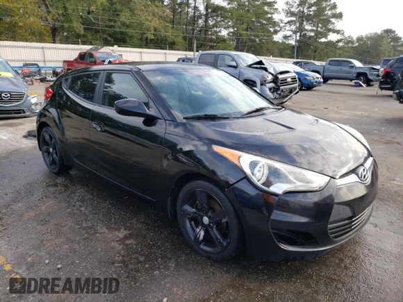 2012 Hyundai Veloster w/Red Int with VIN KMHTC6ADXCU063897, listed as a Copart auction lot 82100474 with 191,493 mi miles and Salvage title. Bid and sale history available at DreamBid. Image 4.