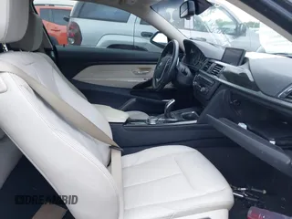 2015 BMW 4 Series 428i with VIN WBA3N3C54FK233803, listed as a IAAI auction lot 40481486 with 74,556 mi miles and . Bid and sale history available at DreamBid. Image 5.